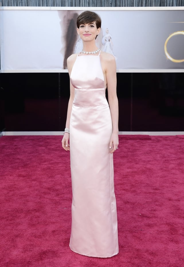 Anne is simply magnificent in this minimal pink column Prada dress in 2013. We think this is her best Oscars look to date. She won the Oscar on the night for Best Supporting Actress in 'Les Miserables'.
