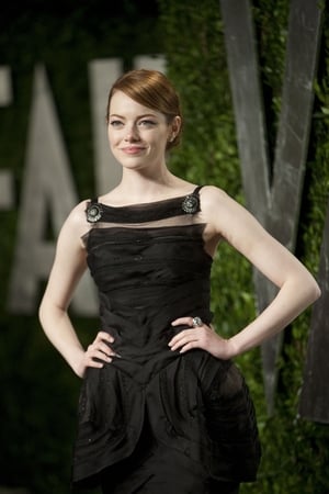 Really cute Emma in this elaborated Chanel Couture black dress at the Vanity Fair Oscar Party in 2012.
