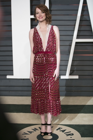 A very chic Altuzarra dress really appropriate for the Vanity Fair Oscars Party in 2015.
