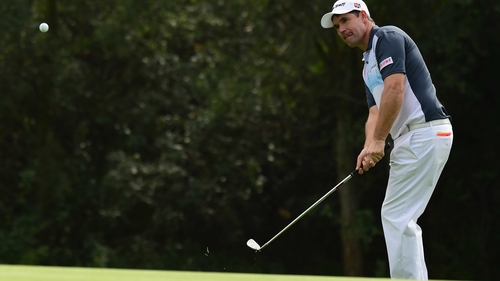 Padraig Harrington escapes a bunker on the 12th hole