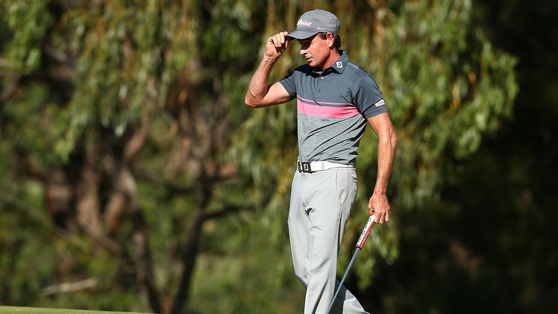 Brett Rumford leads on 13 under