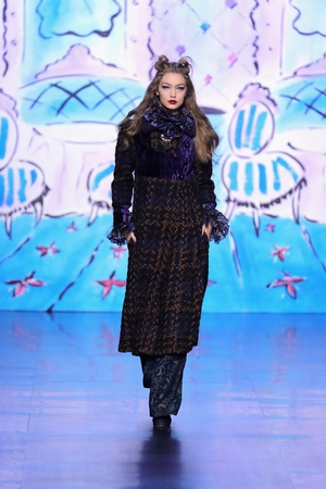 February 15th Day 7: Older Sister Gigi Hadid on the catwalk at the Anna Sui fashion show.