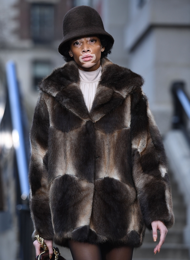 February 16th Day 7: Model Winnie Harlowe in a fur coat at the Marc Jacobs fashion show.