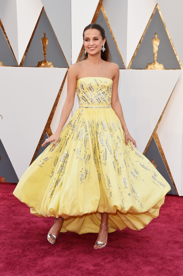 The Louis Vuitton muse in a puffed-out yellow and silver Louis Vuitton dress in 2016! Alicia looked like a princess when she won the award for Best Supporting actress for 'The Danish Girl' this year.