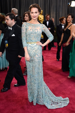 Alicia looks simply stunning in this blue sequin embroidered Elie Saab gown at the ceremony in 2013.