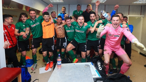 The Lincoln City team celebrate their win