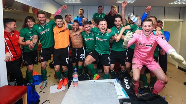 The Lincoln City team celebrate their win