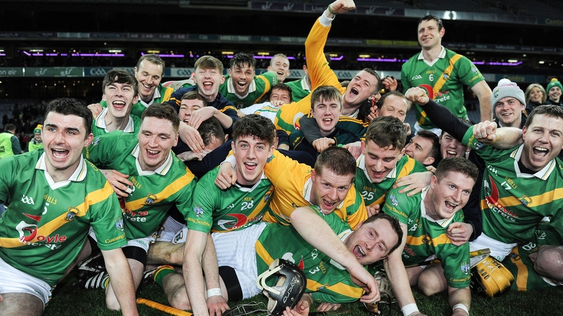 Carrickshock players celebrate on the Croke Park pitch after their All-Ireland win