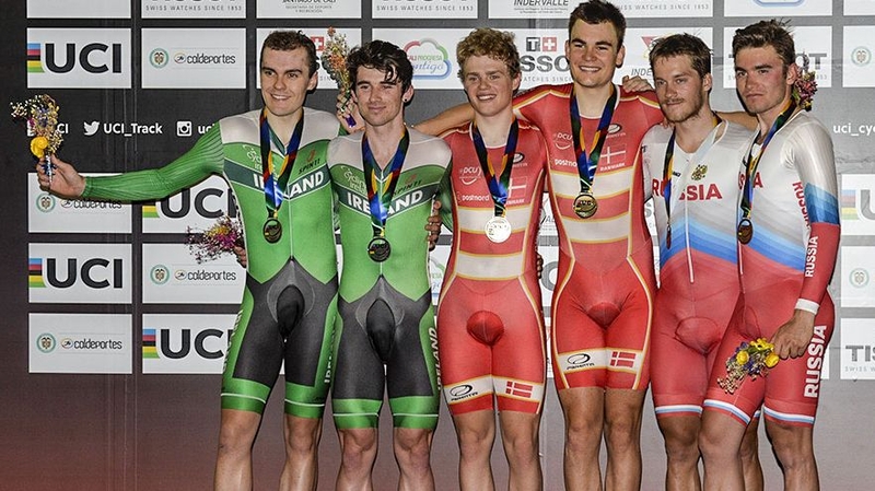 Mark Downey (L) and Felix English (2nd L) on the podium in Colombia