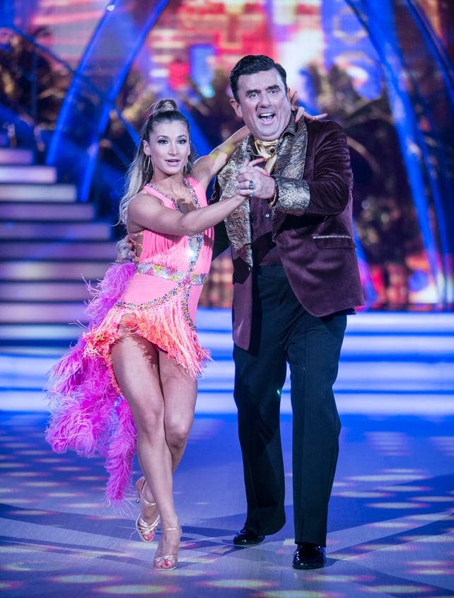 Week 7: Dancing Dessie rocked a burgundy and gold jacket for his Samba with Ksenia who looked fabulous in fluorescent pink, purple and orange.