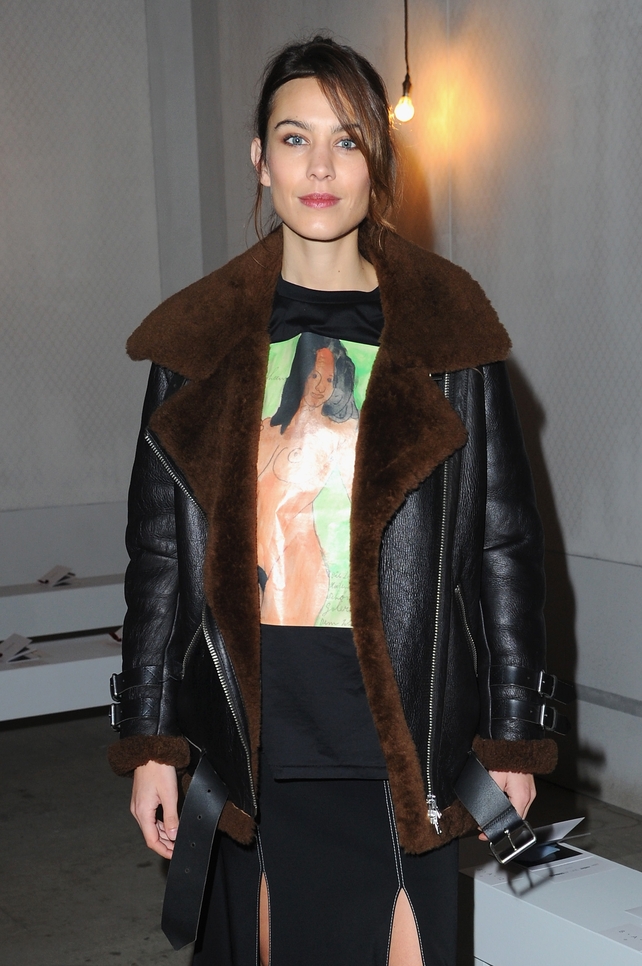The beautiful Alexa Chung in an oversized aviator coat and thigh splitting skirt.