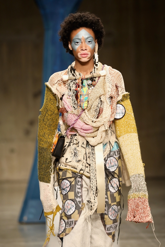 Model Winnie Harlow looks out of this world with this blue make-up at the Matty Bovan fashion show.