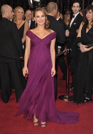 The iconic purple Rodarte gown Natalie wore and she picked up her Oscar for 'Black Swan' in 2011. Maternity suits her so well.