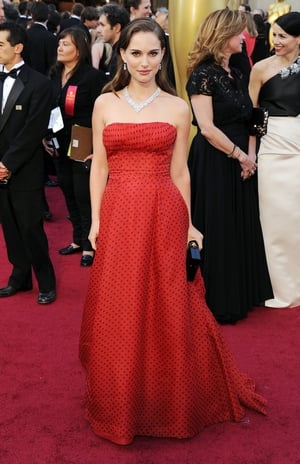 Natalie mixes things up on the red carpet with a vintage Dior polka-dot dress and Harry Winston diamonds in 2012.