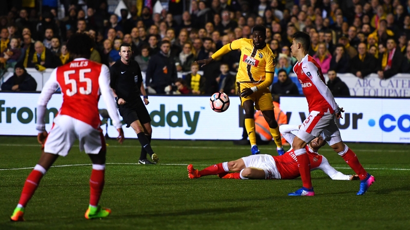 Sutton's Bedsente Gomis shoots at goal