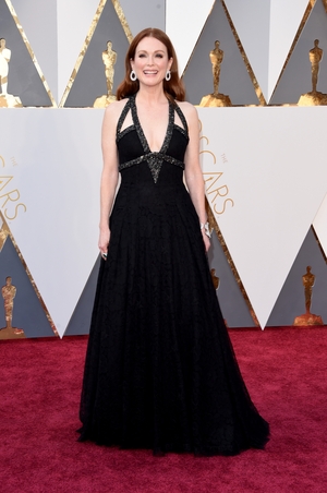 Julianne Moore stuns in Chanel Couture at the 2016 ceremony. We love those large hoop diamond earrings!