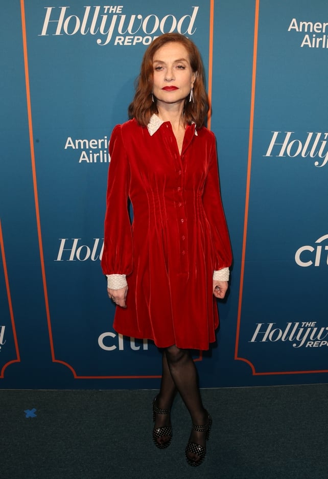 The french icon looks lovely in a velvet Dior dress and matching lipstick at the Hollywood Reporter Nominees Night this year.