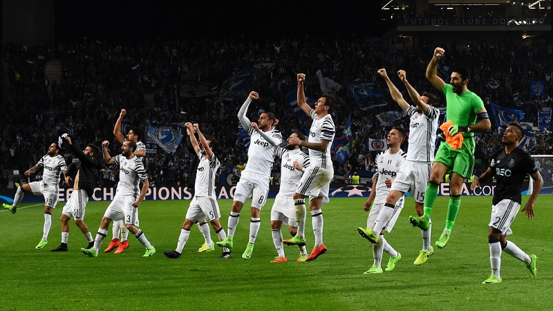 Juventus players celebrate in front of their fans at the end