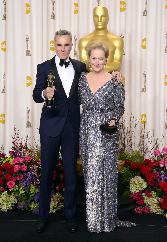 In 2013 accompanied by actor Daniel Day-Lewis and wearing a sequined Lanvin gown with elaborate shoulder pads.