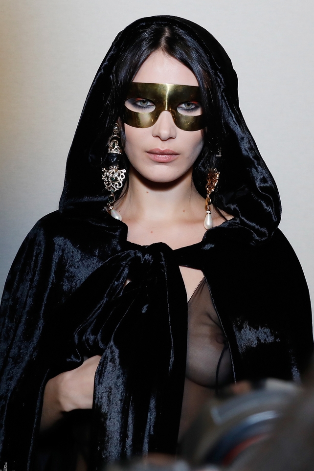 Sicilian Madonna. Bella Hadid is unrecognizable behind her mask at the Alberta Ferretti show.