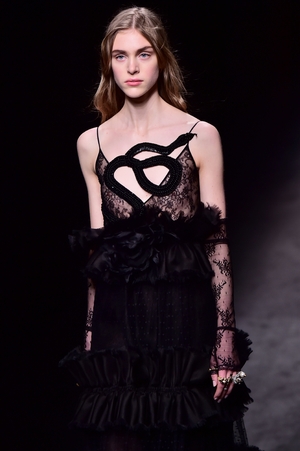 This elaborate snake element of this Gucci dress is everything!