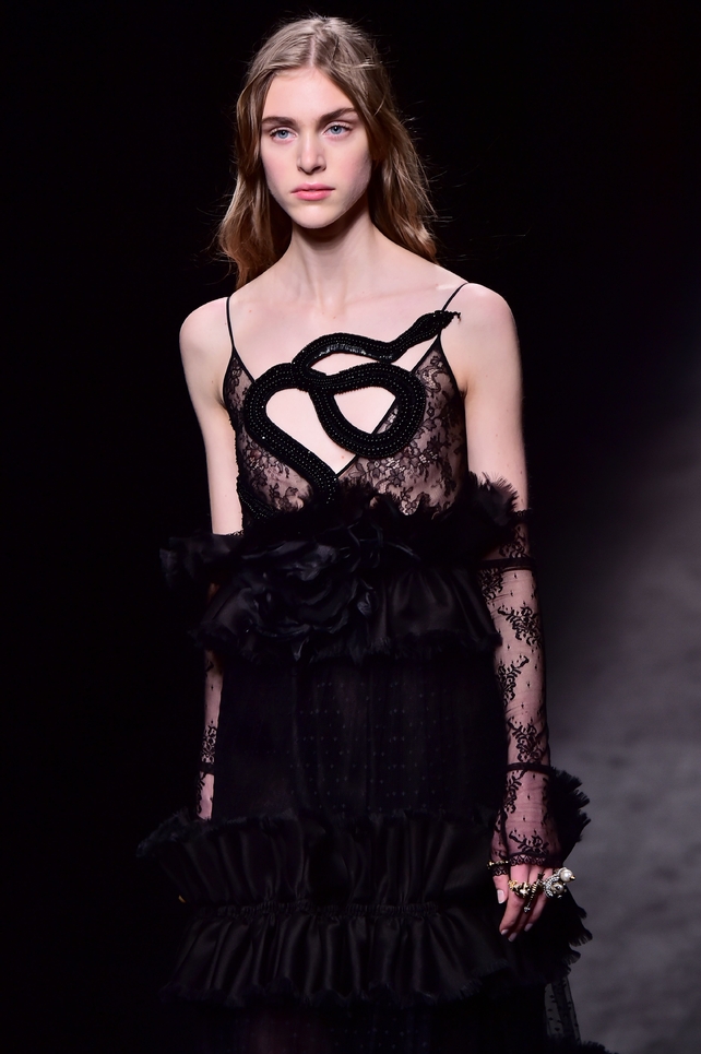 This elaborate snake element of this Gucci dress is everything!