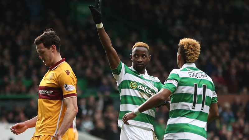 Moussa Dembele celebrates after scoring the opening goal