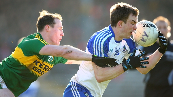 Monaghan goalscorer Jack McCarron is tackled by Mark Griffin