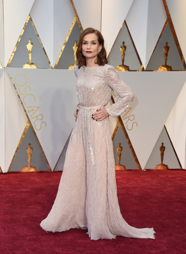 Nominee for Best Actress 'Elle' Isabelle Huppert looks old school Hollywood in this glitzy Armani Privé gown.