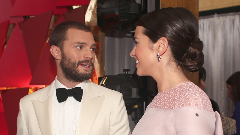 Northern Irish actor Jamie Dornan and his wife, actress Amelia Warner looked beautiful together at the Oscars last night in the Dolby Theatre in Los Angeles for the 89th Academy Awards. #supercute