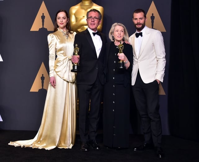 Dakota Johnson, production designer David Wasco and art director Sandy Reynolds-Wasco, winners of Best Production Design for La La Land and Jamie Dornan