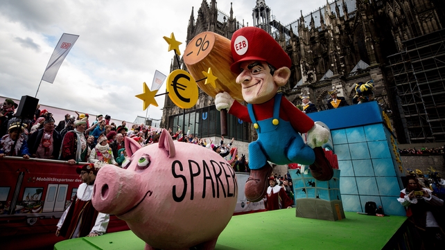 A float featuring ECB President Mario Draghi in Cologne