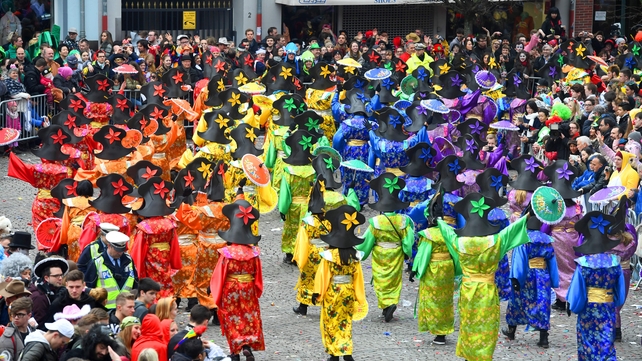 Revellers pack the streets to party, consume large amounts of alcohol and sing and dance