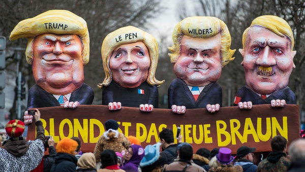 A float depicting Donald Trump, French far-right leader Marine Le Pen, Dutch MP Geert Wilders and Adolf Hitler with blond hair in Duesseldorf