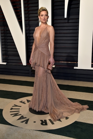 Kate Hudson followed the plunging neck line trend in this sheer Cavalli Couture gown.