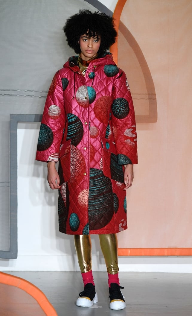 This Liselore Frowijn galaxy coat is out of this world. We're loving the 80's gold leggings.