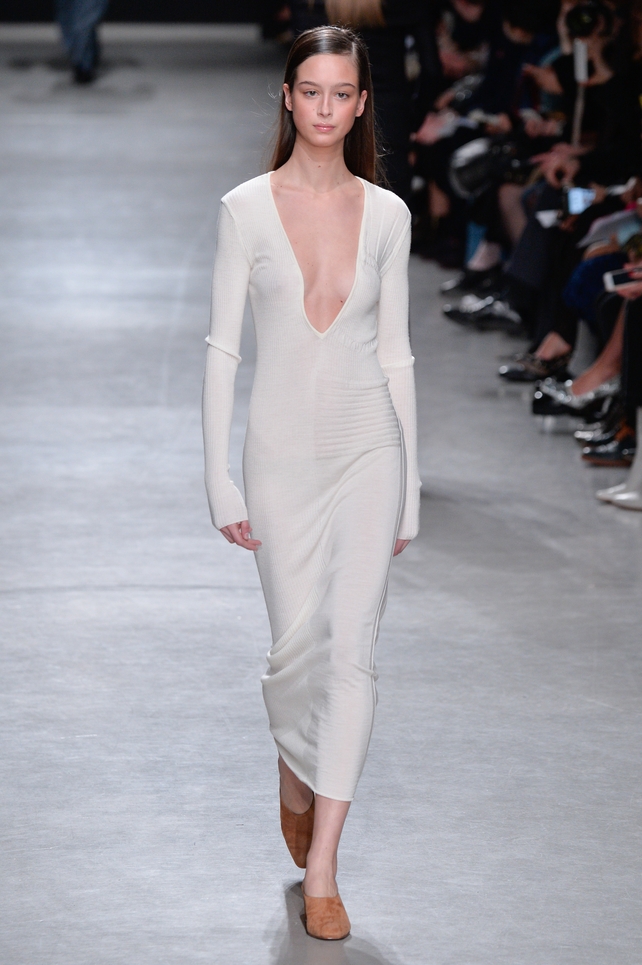 We love the plunging neckline of this dress at the Guy Laroche Fashion Show. Check out those camel suede shoes!