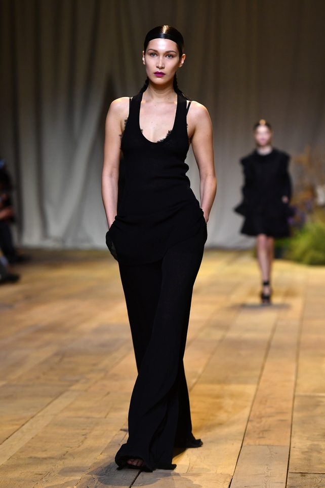 Bella Hadid looks striking in black at the H&M Studio Fashion Show.