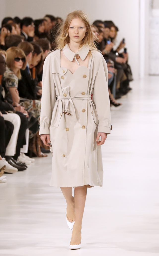 THE Parisienne trench coat is revisited by Maison Margiela and it's not a coat anymore!
