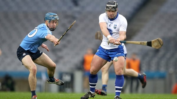 Dublin's Rian McBride and Waterford's Noel Connors battle for possession