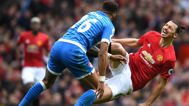 Tyrone Mings (L) and Zlatan Ibrahimovic clashed at Old Trafford