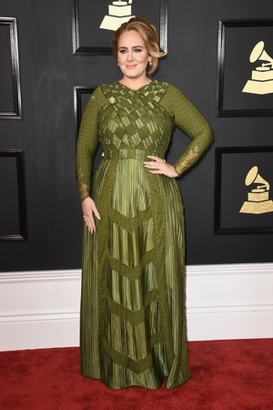 The dissensions dress... Adele is mesmerizing as always in this Givenchy gown at the Grammys, winning five well deserved awards!