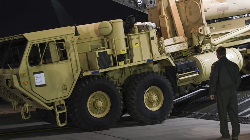 Part of the US missile defence system being unloaded from a cargo plane at the Osan Air Base in Seoul, South Korea