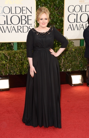 A true Bond Girl, Adele won the Best Original Song for 'Skyfall' at the Golden Globes in 2013. The British singer looked sophisticated in British brand Burberry.