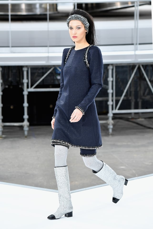 Ready to launch in her cosmic boots at the Chanel Fashion Show!