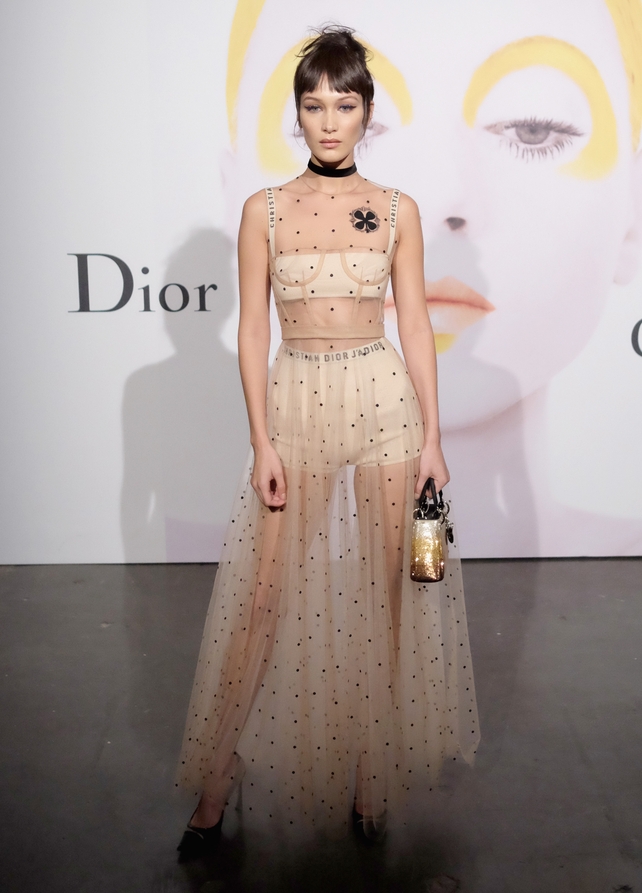 J'aDior!The model looks beautiful at the Dior - Beauty Celebrates The Art of Color event in 2016 wearing a polka dot ensemble.
