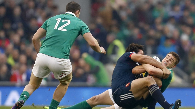 France's Rémi Lamerat tackles Garry Ringrose as Robbie Henshaw looks on