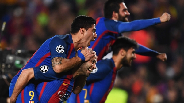 Luis Suarez and Javier Mascherano lead the Barca celebrations