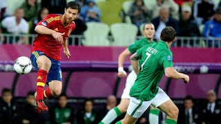 Xabi Alonso (L) has announced his retirement