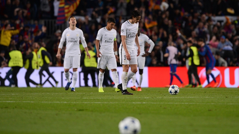 PSG players react following Barcelona's late decisive goal